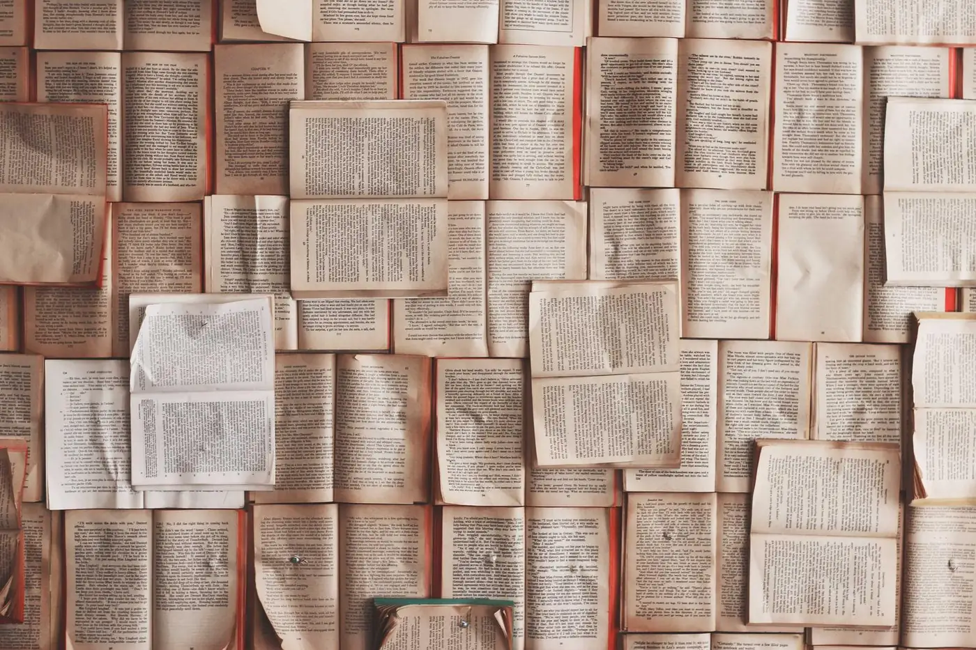 Stacks of old books with worn spines