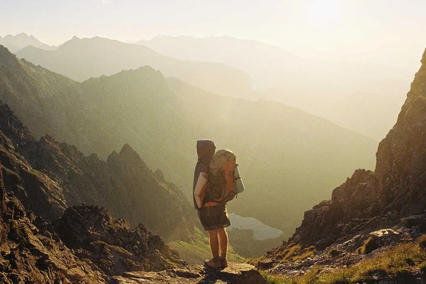 Hiker overlooking a mountain valley